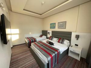 Letto o letti in una camera di Spa Hotel Terme