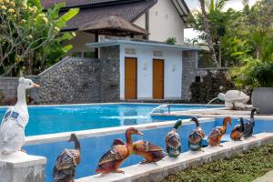 La alberca dentro o cerca de Gita Maha Ubud Hotel by Mahaputra-CHSE Certified