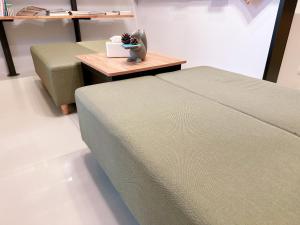 Llit o llits en una habitació de Happy Fat B&B 寵物友善