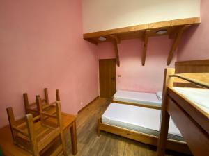 A bed or beds in a room at Středisko ekologické výchovy SEVER