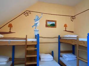 A bed or beds in a room at Středisko ekologické výchovy SEVER