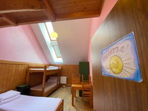 A bed or beds in a room at Středisko ekologické výchovy SEVER