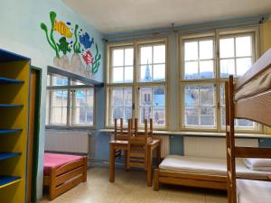 A bed or beds in a room at Středisko ekologické výchovy SEVER