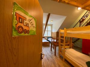 A bed or beds in a room at Středisko ekologické výchovy SEVER