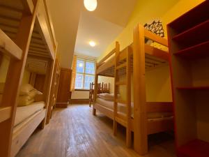 A bed or beds in a room at Středisko ekologické výchovy SEVER