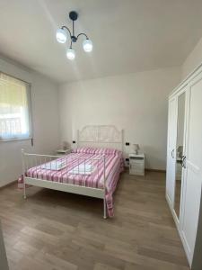 Posteľ alebo postele v izbe v ubytovaní Agriturismo Corte Filippi