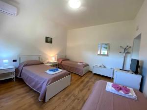 Posteľ alebo postele v izbe v ubytovaní Agriturismo Corte Filippi