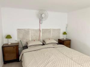 A bed or beds in a room at Twenty2 Apartment