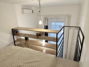 Posteľ alebo postele v izbe v ubytovaní Twenty2 Apartment