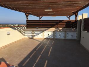a view of the roof of a house at Mazotos Panoramic Village in Mazotos