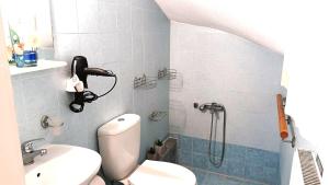 Kúpeľňa v ubytovaní Apartment MARE CALMO by the sea. + 17 fotografií