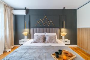 Postel nebo postele na pokoji v ubytování Apartments Tomy