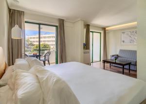 Posteľ alebo postele v izbe v ubytovaní H10 Tenerife Playa