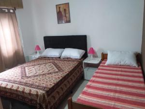 Postel nebo postele na pokoji v ubytování Luz de Luna + 4 fotografie