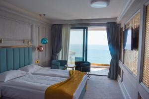 Letto o letti in una camera di Hotel Maris