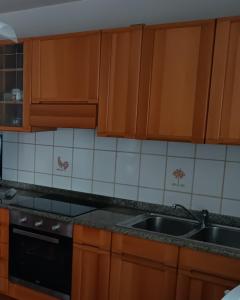 A kitchen or kitchenette at Appartamento della Nonna