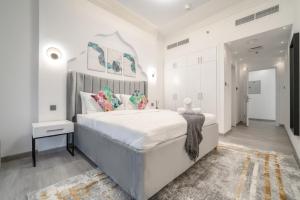Postel nebo postele na pokoji v ubytování Amour Luxury Apartments 5 mins from The Palm