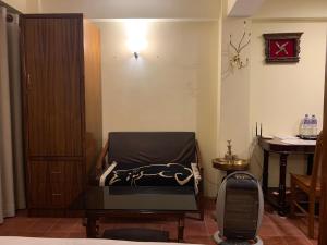 Studio Apartment at UNESCO Heritage Site的休息区