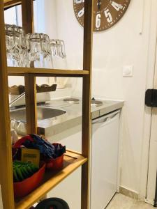 Kuchyňa alebo kuchynka v ubytovaní Habitation CASSIOPEE