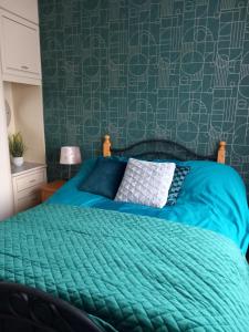 Voodi või voodid majutusasutuse Home Comforts toas