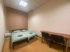 Ліжко або ліжка в номері Si-Yo hostel