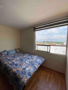 Posteľ alebo postele v izbe v ubytovaní Hermoso departamento en Cuautlancingo