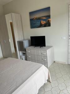 TV a/nebo společenská místnost v ubytování Casa Tacconi
