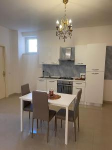 Η κουζίνα ή μικρή κουζίνα στο PALAZZO MAZZINI 1