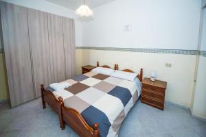 A bed or beds in a room at [Casa sul mare]+Posto auto+Giardino+WiFi