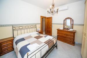 A bed or beds in a room at [Casa sul mare]+Posto auto+Giardino+WiFi
