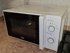 A kitchen or kitchenette at [Casa sul mare]+Posto auto+Giardino+WiFi