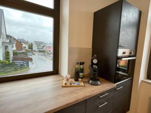Kuchyň nebo kuchyňský kout v ubytování Ferienwohnung Graf Siegfried + 17 fotografií
