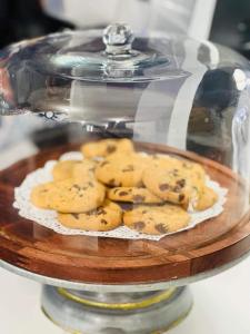 a plate of cookies in a glass jar on a table at EC Reed's Mercantile and Hotel in Marble Hill