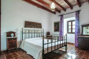 Postel nebo postele na pokoji v ubytování Villa Guillo