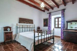 Postel nebo postele na pokoji v ubytování Villa Guillo