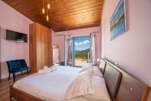 Posteľ alebo postele v izbe v ubytovaní Sunrise Villa