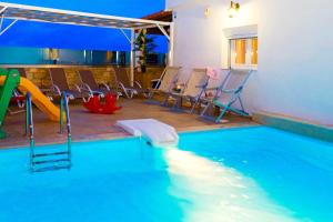 The swimming pool at or close to Villa Thalassa Skaleta