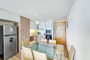 Kuchyň nebo kuchyňský kout v ubytování Miramar Deluxe con Vista al Mar + 15 fotografií
