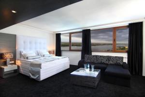 Postel nebo postele na pokoji v ubytování Grand Hotel Riga