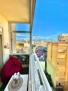 a balcony of a building with a view of a city at Superb Apt Central in Durrës