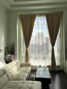 Posezení v ubytování Xin Xin House