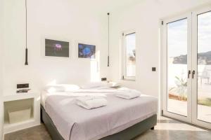 Posteľ alebo postele v izbe v ubytovaní Villa Paradiso Tessera