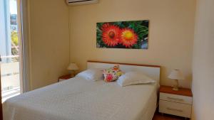 Postel nebo postele na pokoji v ubytování Apartments Jelica