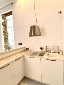 Η κουζίνα ή μικρή κουζίνα στο inncadizcasa Señorial de Rivadavia