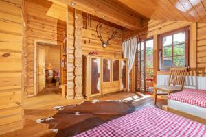 Postel nebo postele na pokoji v ubytování Chalet zum Salamander