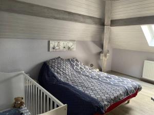 Posteľ alebo postele v izbe v ubytovaní Loft avec jardin