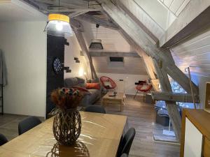 Posedenie v ubytovaní Loft avec jardin