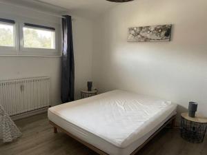 Posteľ alebo postele v izbe v ubytovaní Loft avec jardin