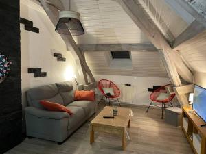 Posedenie v ubytovaní Loft avec jardin