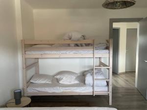Posteľ alebo postele v izbe v ubytovaní Loft avec jardin